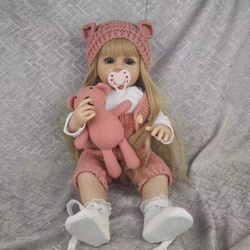 22-inch reborn baby doll with long golden hair, lifelike face and limbs with 3D painted skin and visible veins. A birthday gift for boys and girls. Halloween / Thanksgiving / Christmas gift. Easter gift.